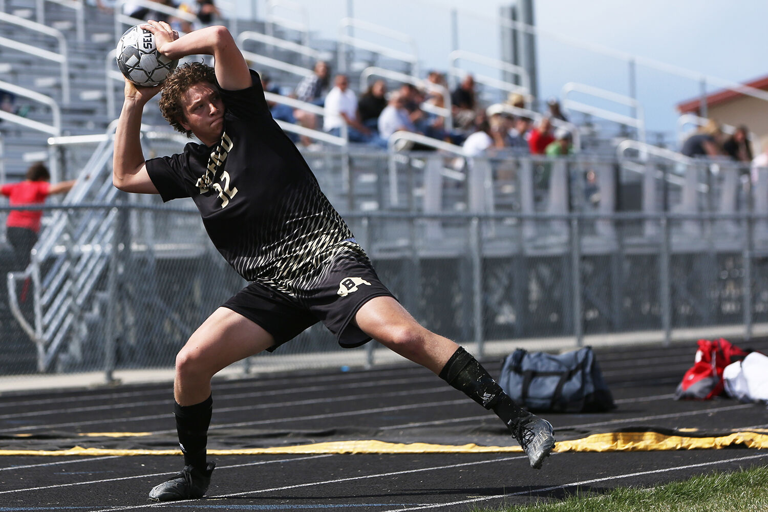 Calvin Rule looks for an open man during a first half throw-in